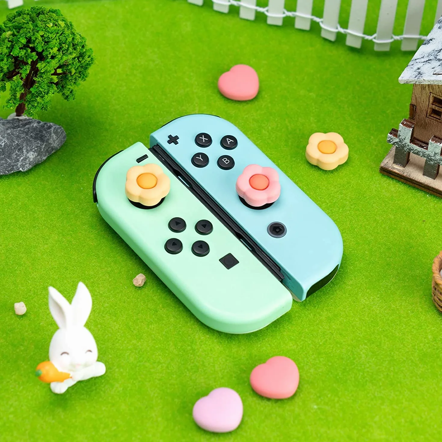 GeekShare Silikonowe nakładki na kciuki Joystick, osłona joysticka kompatybilna z Switch/OLED/Switch Lite, 4 szt. - serce i kwiat (różowy i żółty)